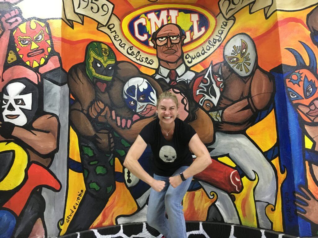 Allison Nevins in her Santo shirt at lucha libre.